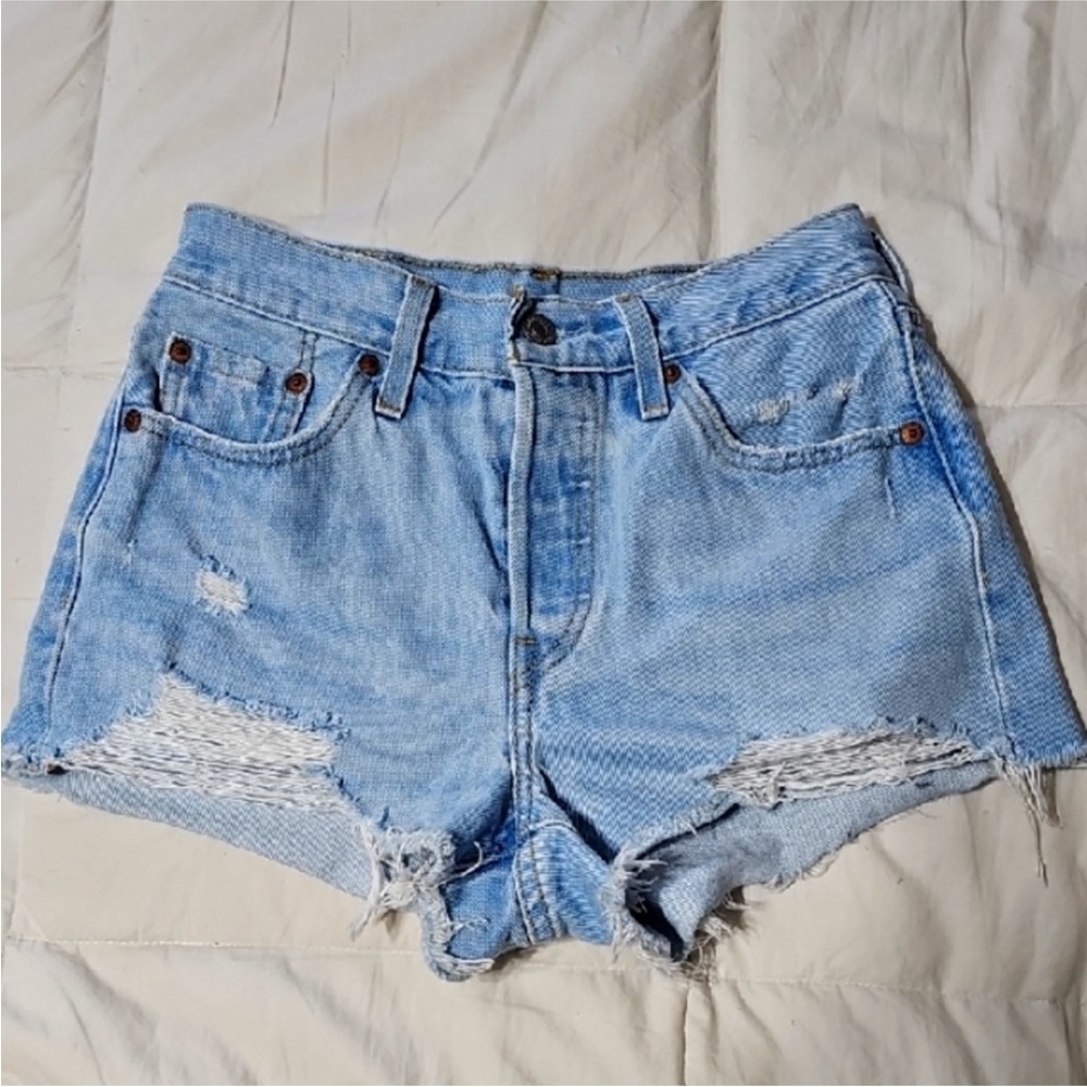 Women’s 501 Levi Distressed Shorts. 2” Inseam 12 1/2” Waist